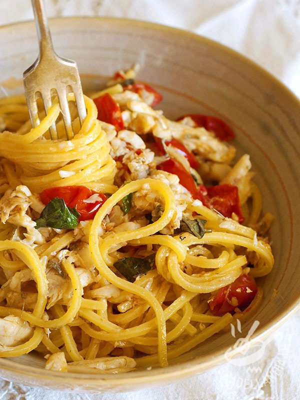 Spaghetti al nasello e pomodorini